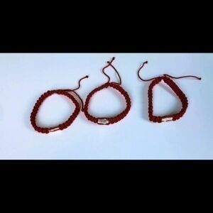 Handmade Lot of 3 red macrame saint Jude beaded adult bracelets.